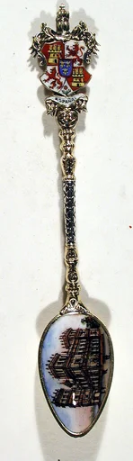 Souvenir spoon with view of Palais Royal and arms of Spain
