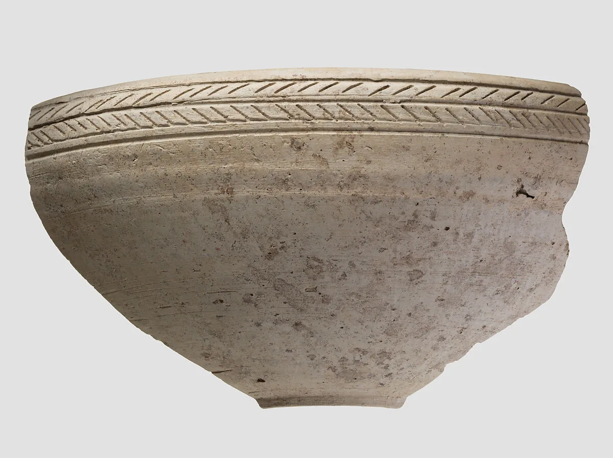 Bowl rim sherd with incised decoration — Unknown