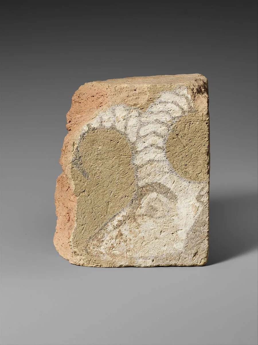 Brick fragment with the head of an ibex — Unknown