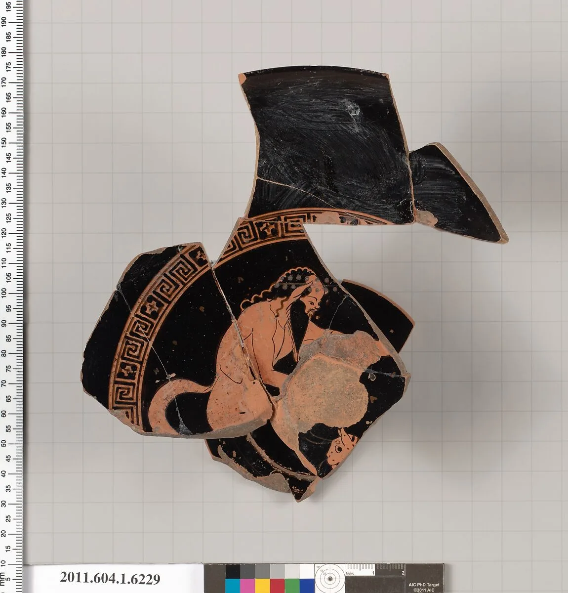 Terracotta fragment of a kylix (drinking cup) — Eucharides Painter
