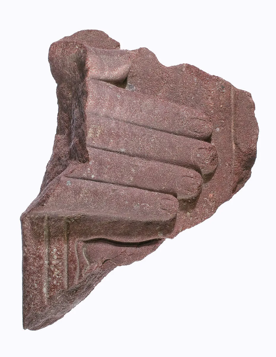 Hand from a stelophorous statue with part of the Horus name of Akhenaten (?) — Unknown