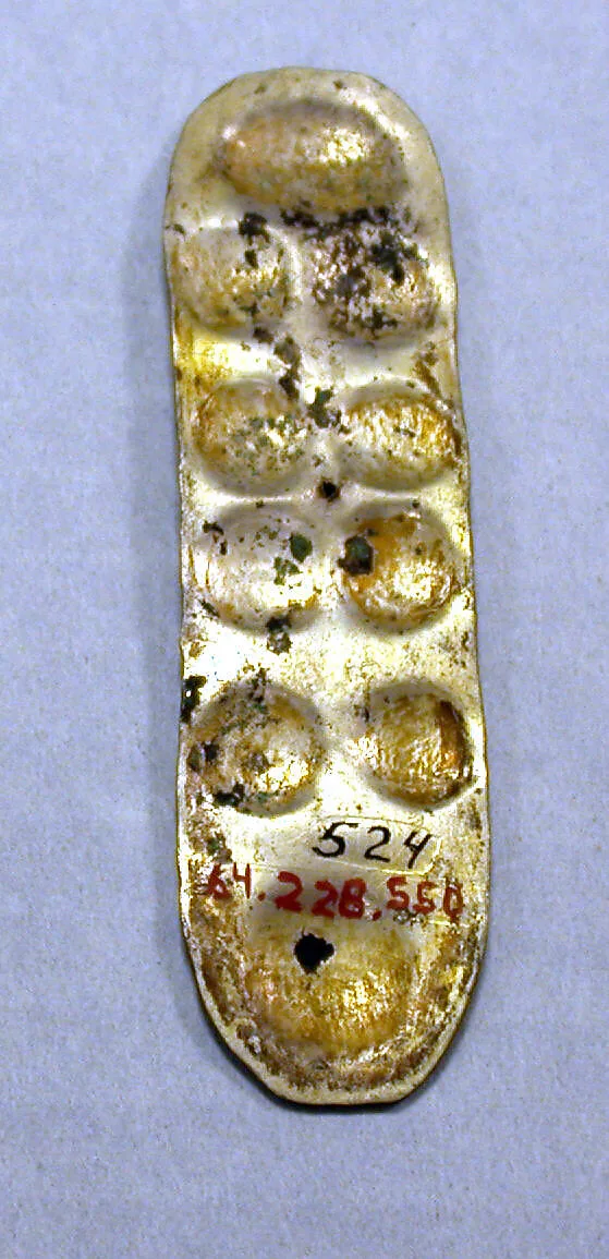 Hammered Silver Ornament with Repoussé Disks — Unknown