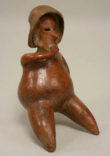 Figure on Stool