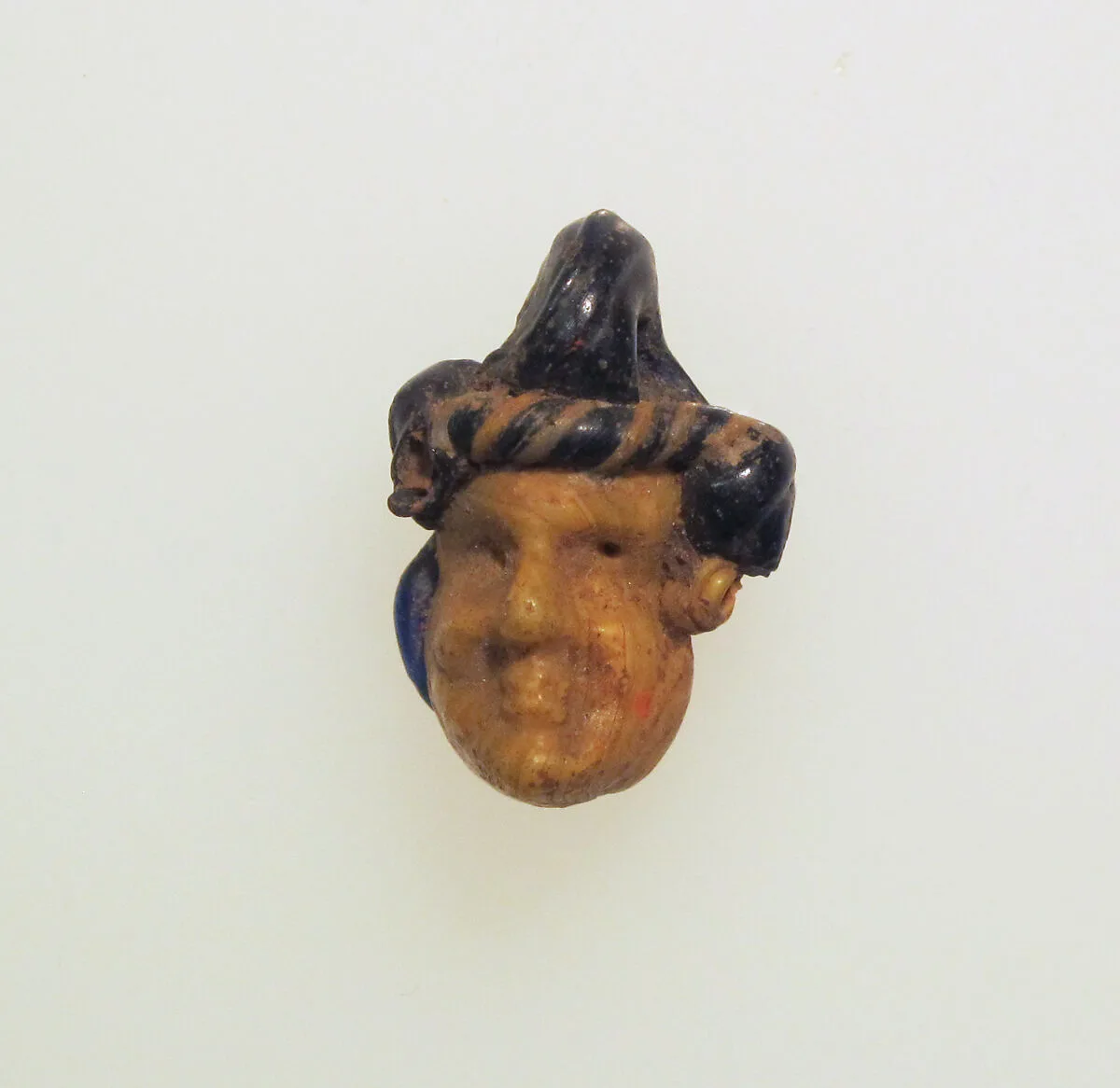 Glass head pendant — Unknown