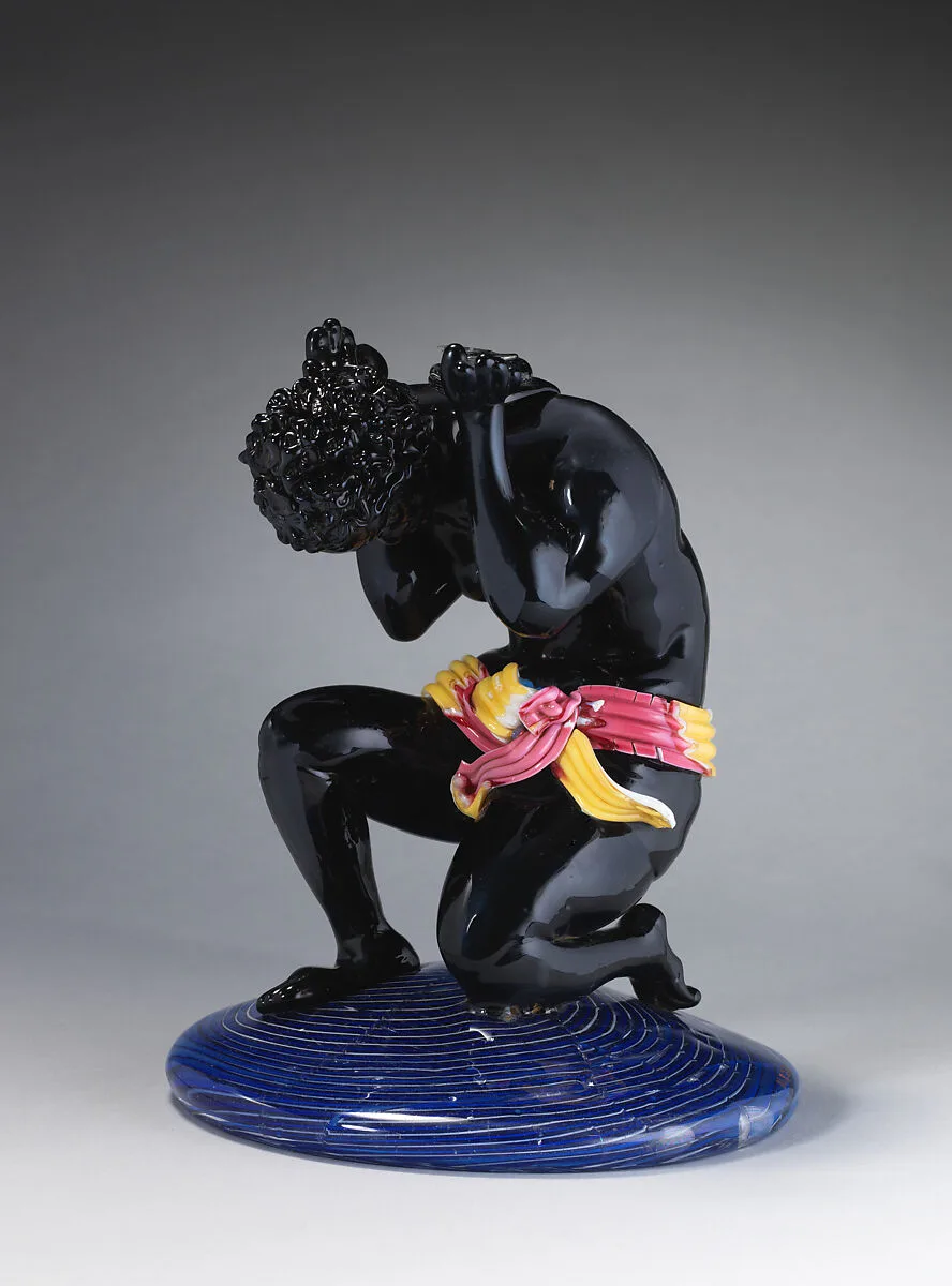 Kneeling African figure — Unknown