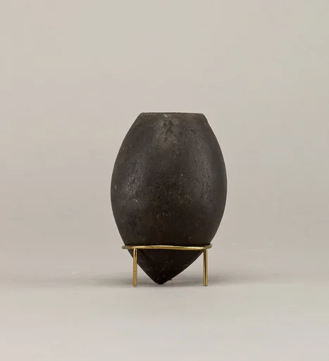 Black ware jar with pointed base