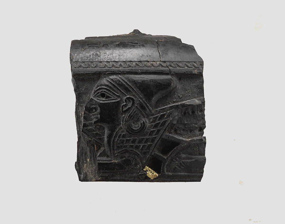 Cosmetic box fragment carved in relief with the head of a sphinx — Unknown