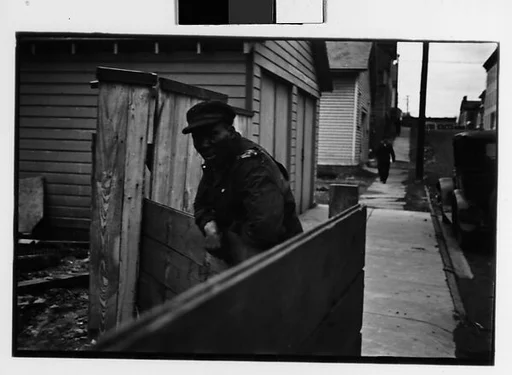 [Three 35mm Film Frames: Men on Street, Hudson, New York]