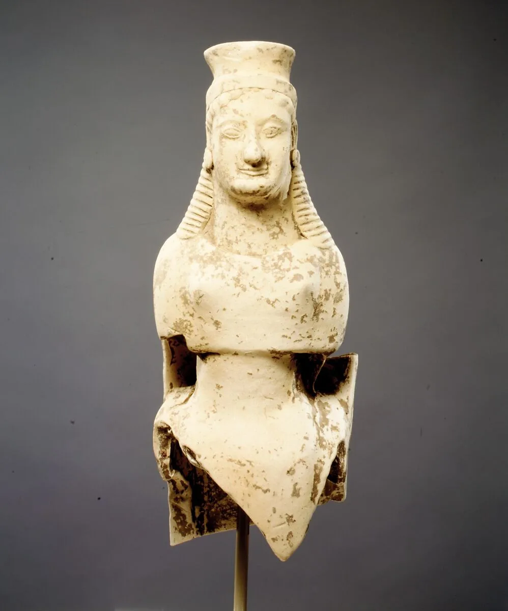 Terracotta figure of a woman — Unknown