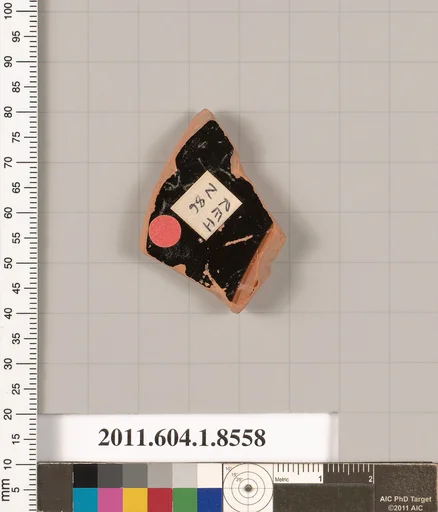 Terracotta fragment of a stemless kylix (drinking cup)
