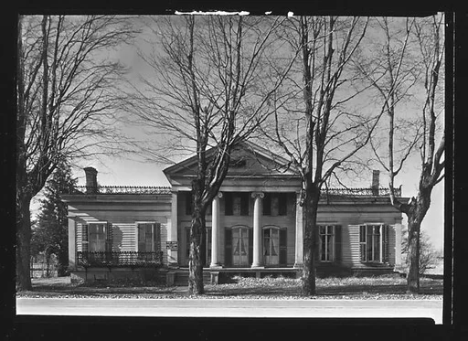 [Greek Revival House with Ionic Columns in Full Height Entry Porch and For Sale Sign, New York State?]