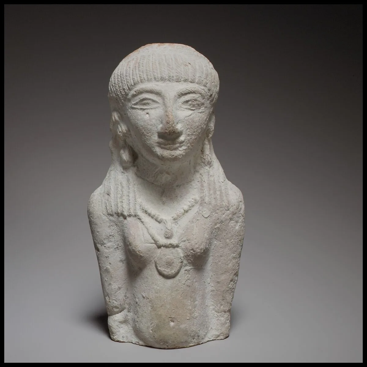 Standing female figurine — Unknown