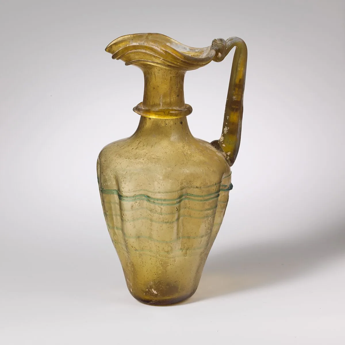 Glass jug with trefoil rim — Unknown