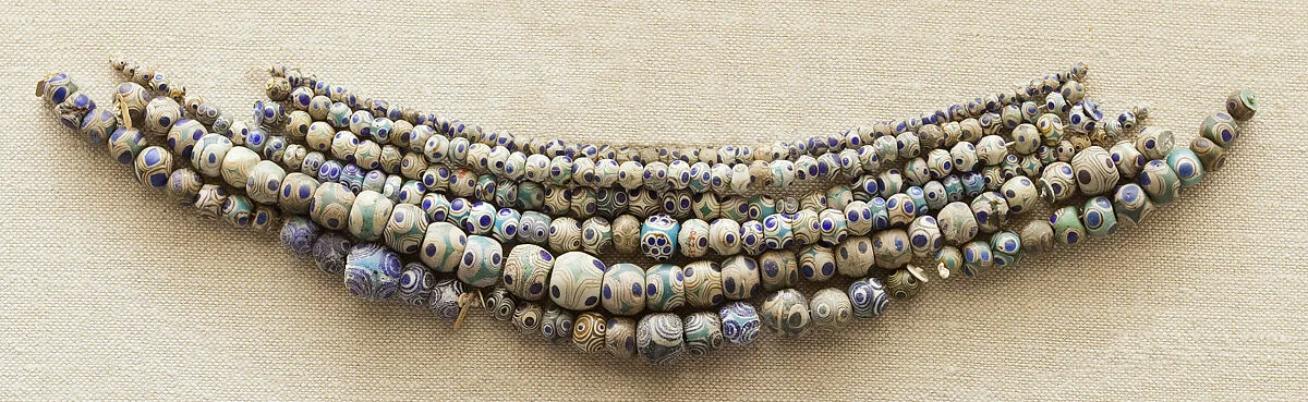 String of 50 Eyed Beads — Unknown