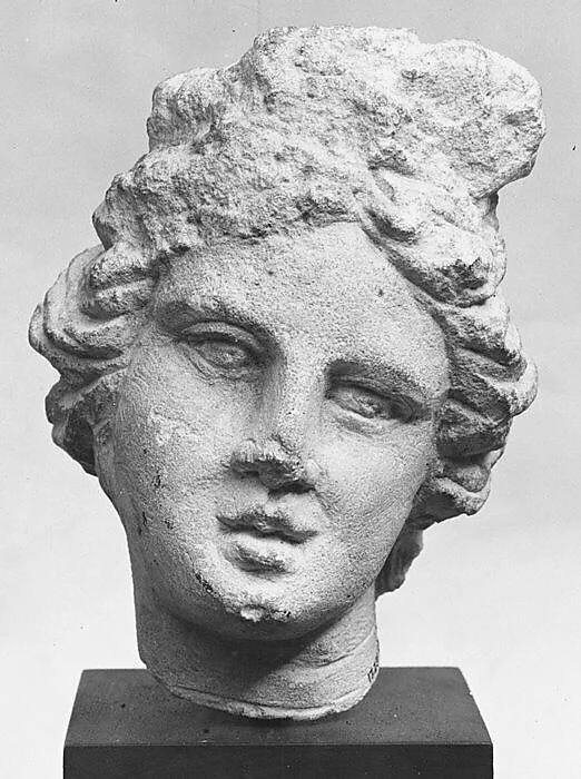 Limestone head of a girl — Unknown