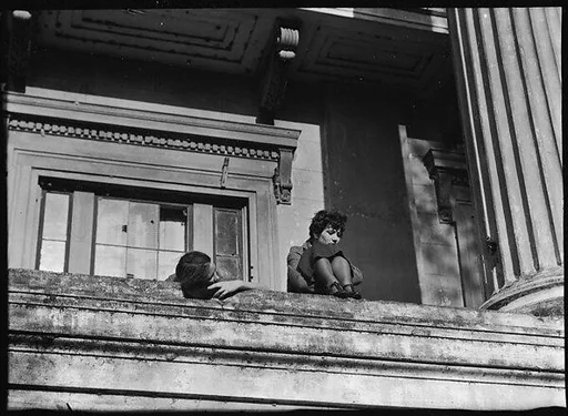 [Jane Ninas and Christine Fairchild on the Balcony of Belle Grove Plantation, White Castle, Louisiana]