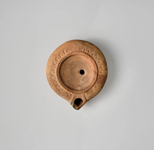 Terracotta oil lamp