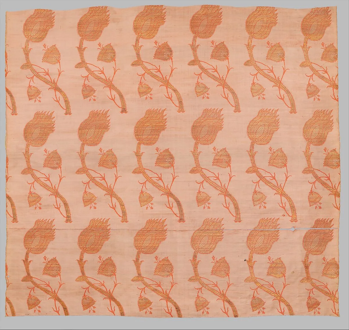 Textile Fragment with a Repeating Pattern of Interlocked Tulips and Poppies — Unknown