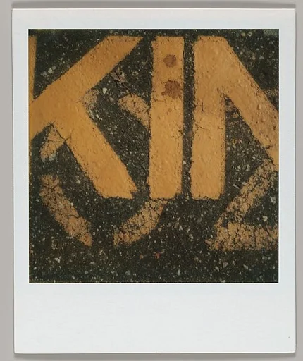 [Detail of Street Lettering: "KIN"]