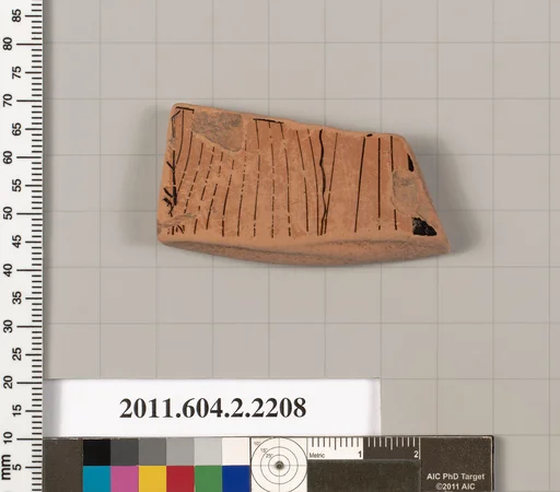Terracotta fragment of a pot; unglazed on the inside