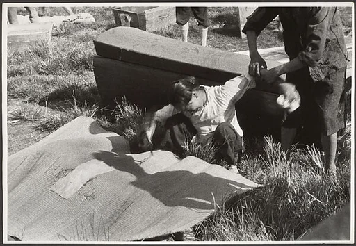 A woman mourns her husband, killed in the battle of Taierhchwang, April