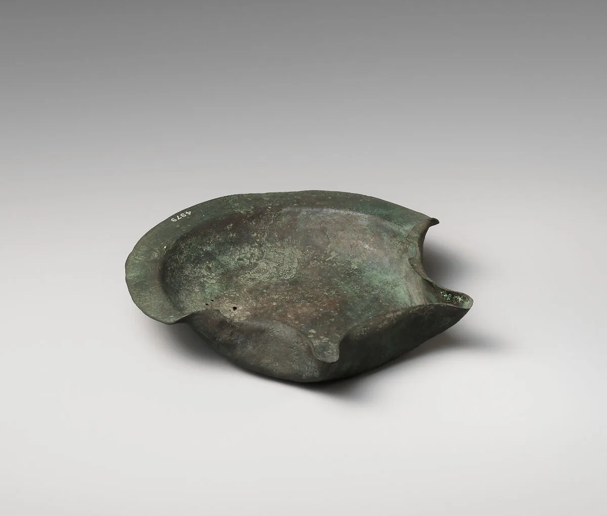 Bronze saucer-shaped lamp — Unknown