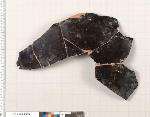 Terracotta fragment of a kylix (drinking cup)