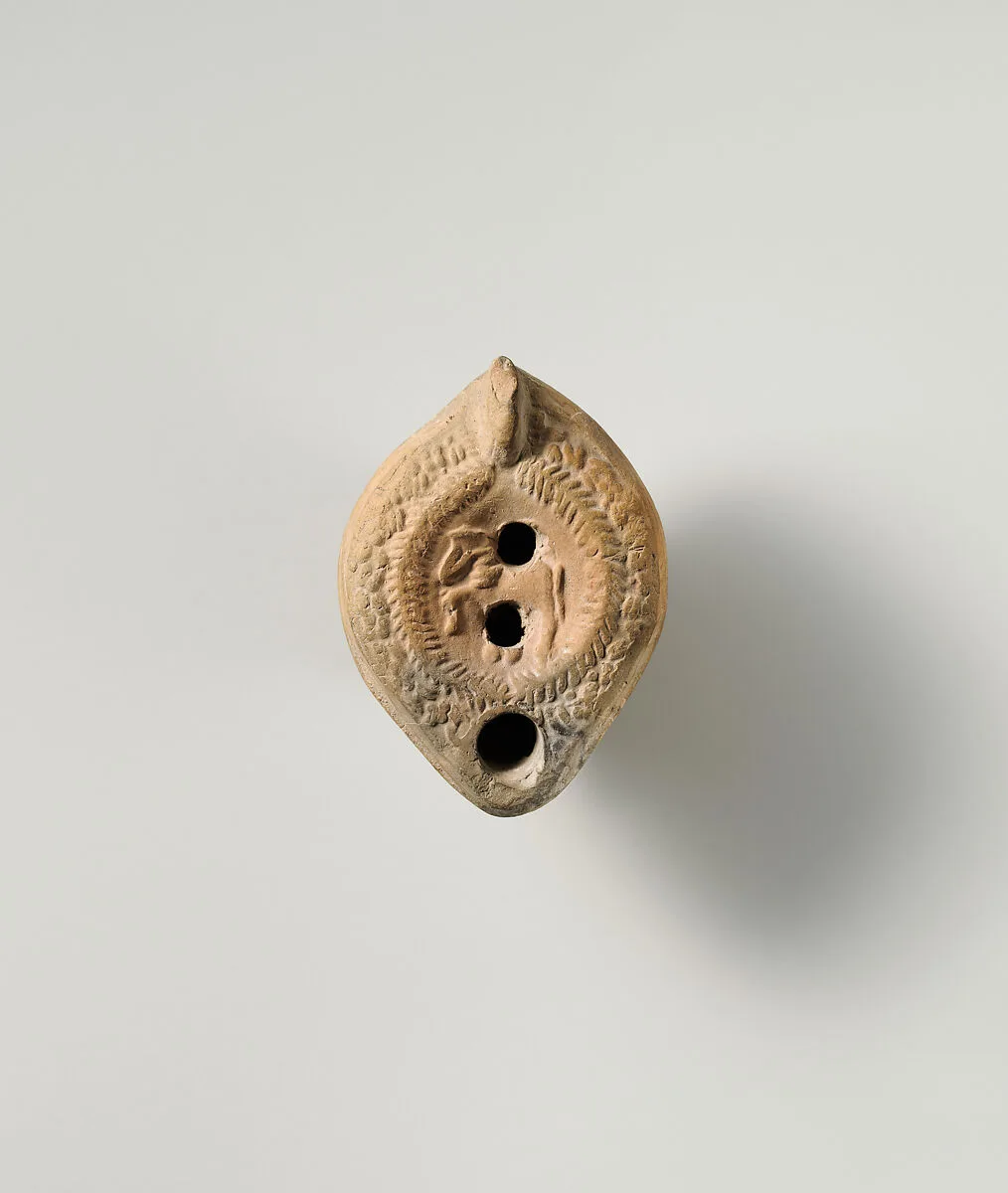 Terracotta oil lamp — Unknown