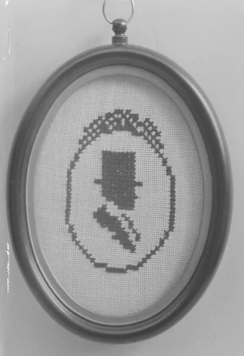Head of a man in a top hat