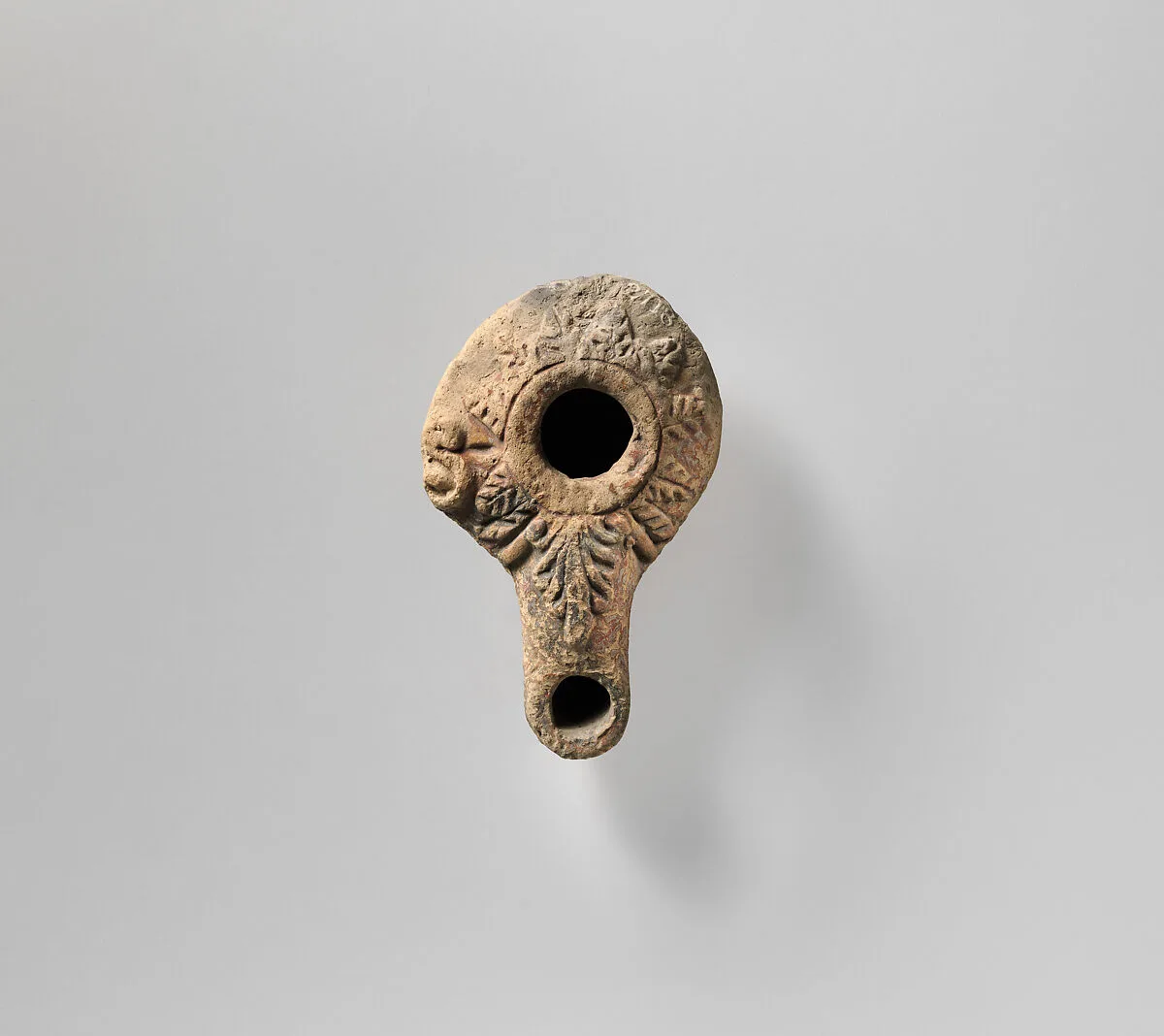 Terracotta oil lamp — Unknown