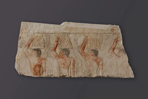 Relief Fragment depicting offering bearers from the mastaba of Idut, daughter of King Unis (?)