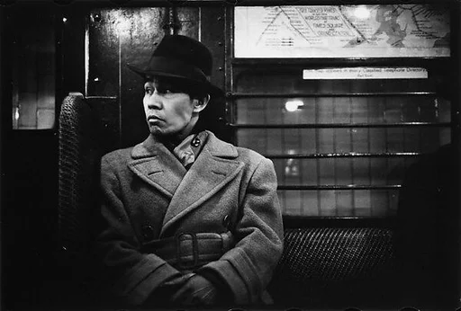 [Three 35mm Film Frames: Subway Passengers, New York City: Man in Hat and Overcoat]
