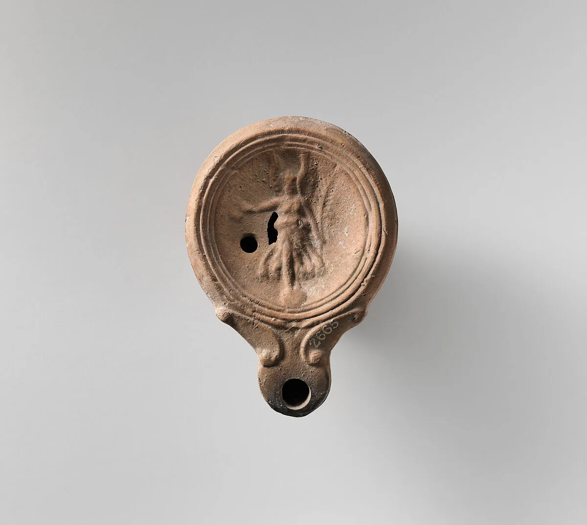 Terracotta oil lamp — Unknown