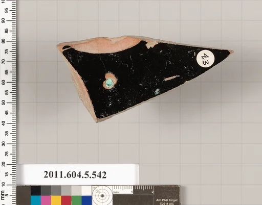 Terracotta fragment of a kylix (drinking cup)
