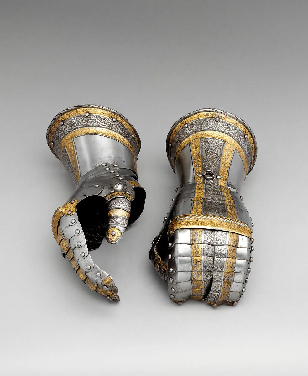 Pair of Gauntlets from a Garniture of Armor of Philip II of Spain (reigned 1556–98) — Ulrich Holzmann|Desiderius Helmschmid