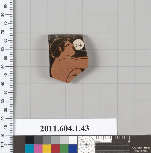 Terracotta rim fragment of a kylix (drinking cup)
