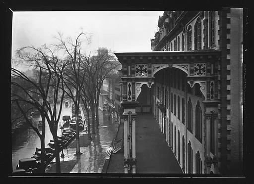 [View of Broadway with Parked Cars and Side View of Grand Union Hotel Porch, Saratoga Springs, New York]