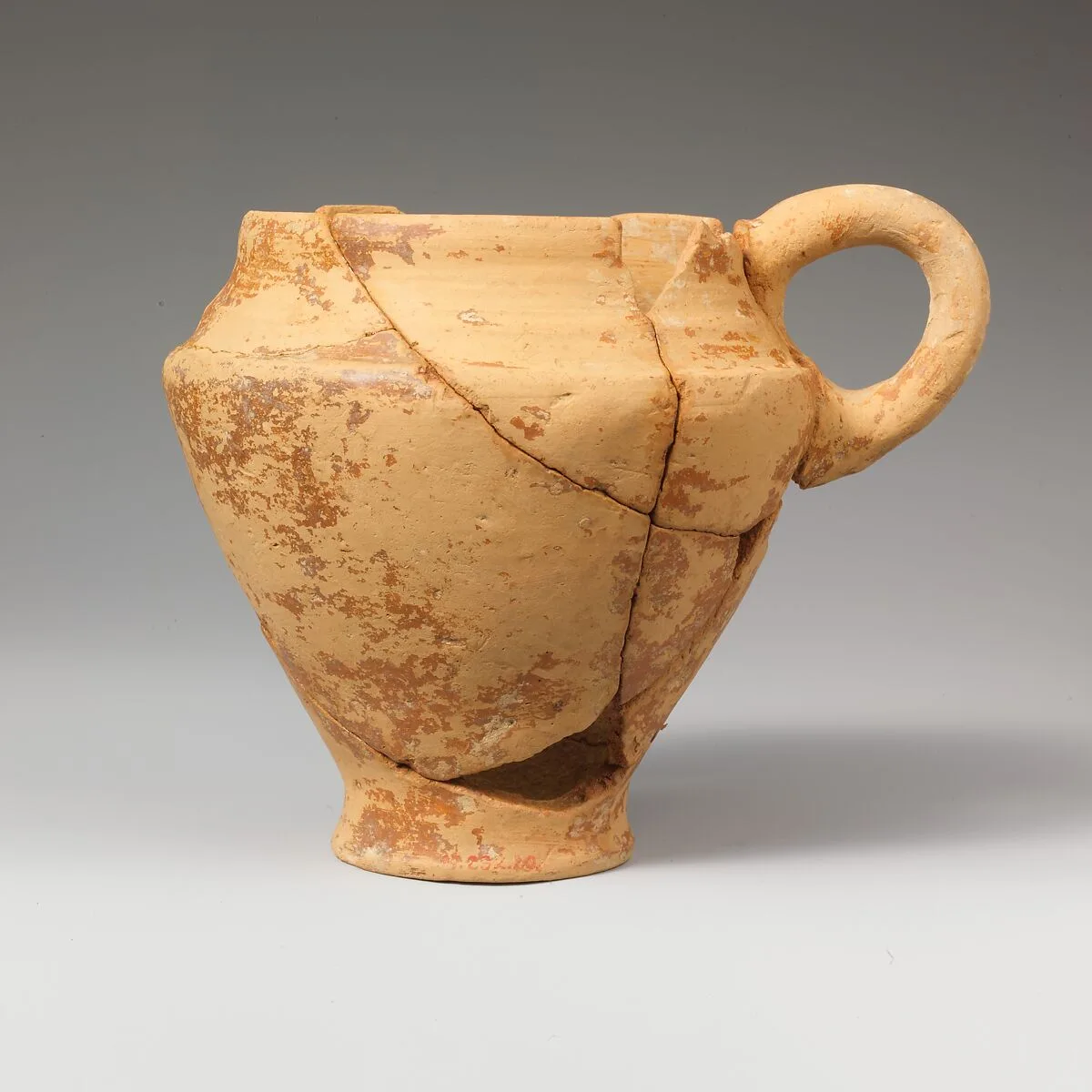 Terracotta carinated bridge-spouted jug — Unknown