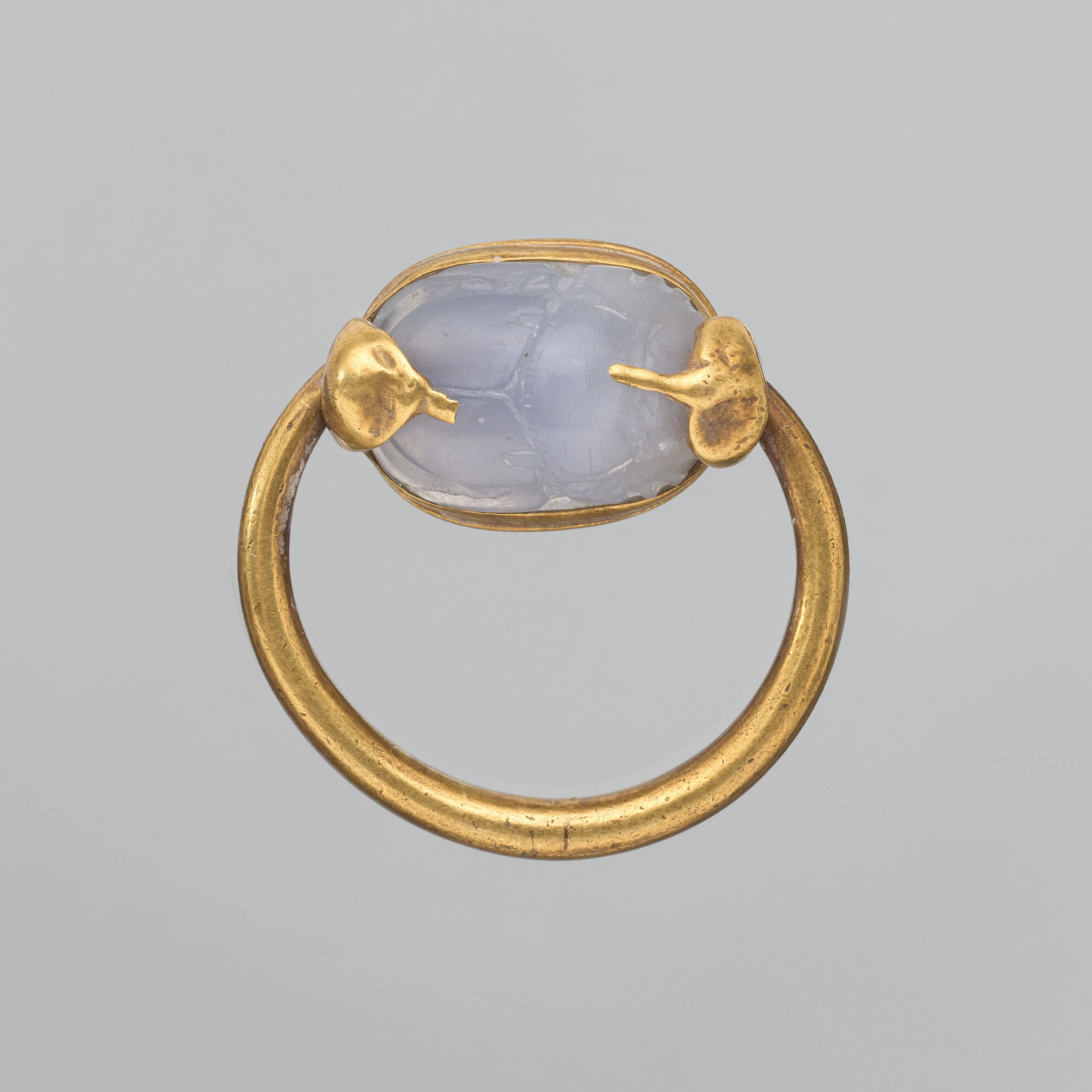 Gold ring with chalcedony scaraboid — Unknown
