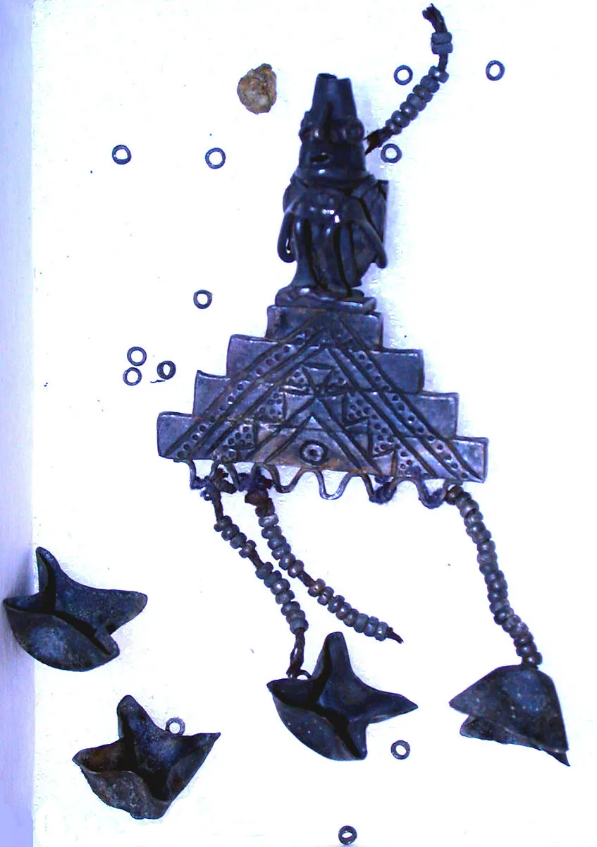 Seated Figure Ornament with Dangles — Unknown