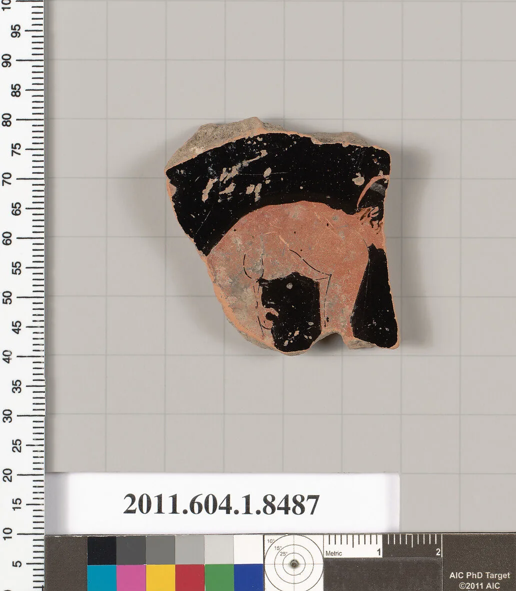 Terracotta fragment of a stemless kylix (drinking cup) — Unknown
