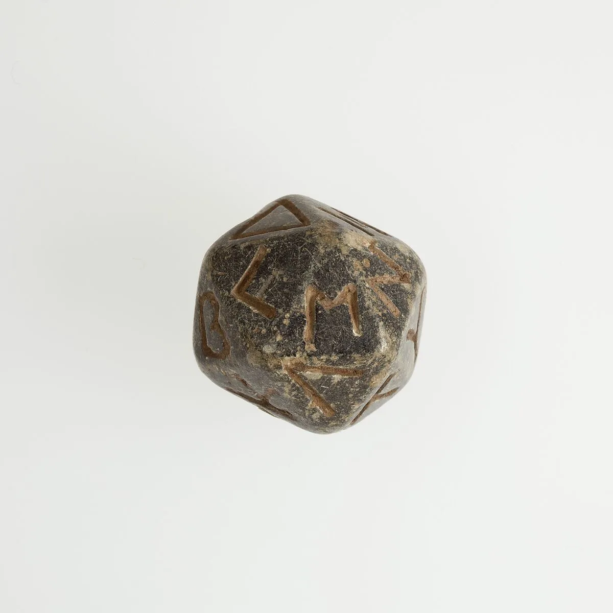 Twenty-sided die (icosahedron) with faces inscribed with Greek letters — Unknown