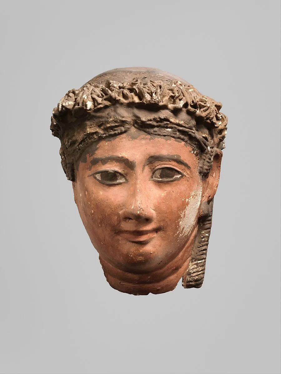 Mask of a woman with corkscrew locks and ball earrings — Unknown