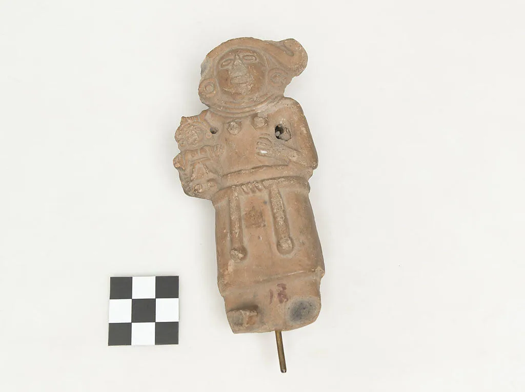 Female Figure with Child — Unknown