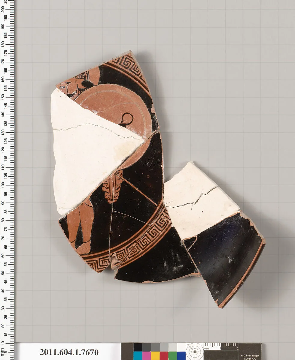 Terracotta fragment of a kylix (drinking cup) — Boot Painter