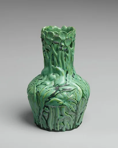 Vase with arrowhead plants