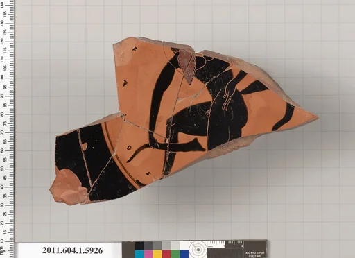 Terracotta fragment of a kylix (drinking cup)