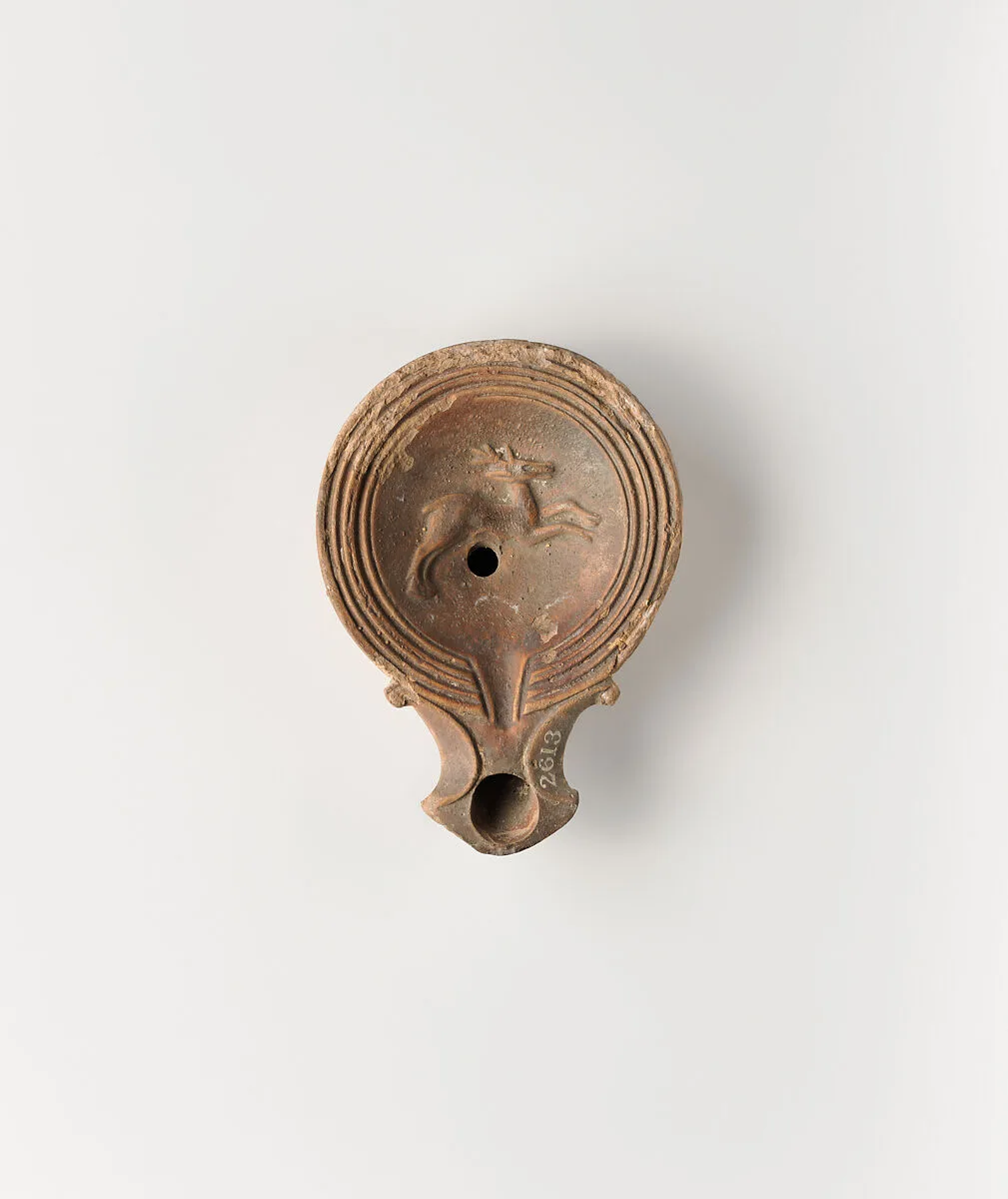 Terracotta oil lamp — Unknown