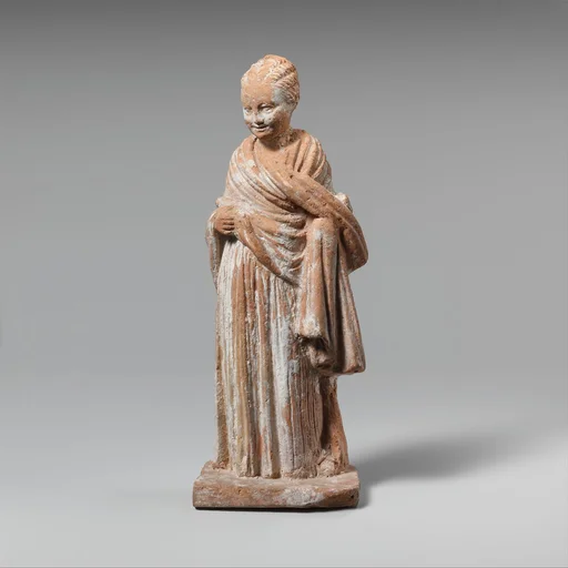 Terracotta statuette of a standing girl