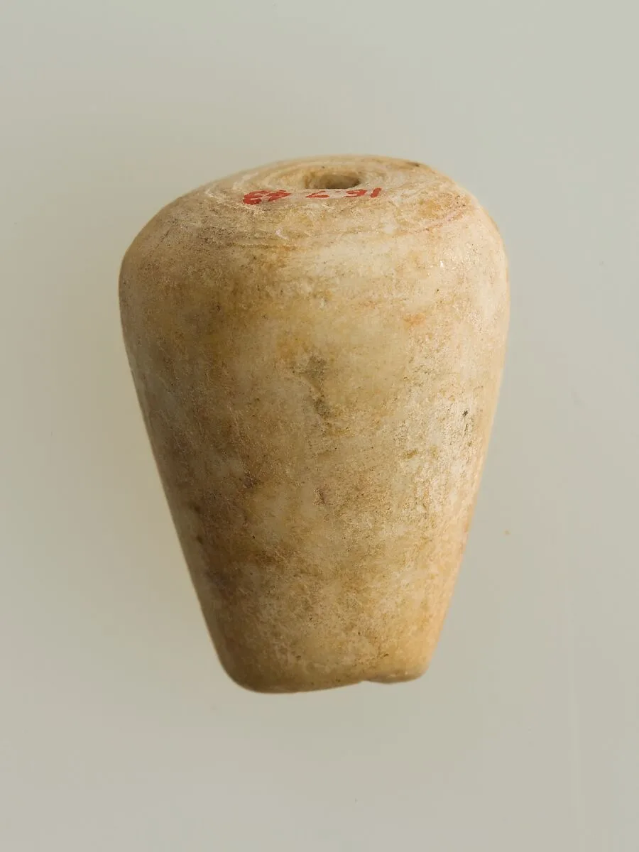Shell pendant or bead — Unknown